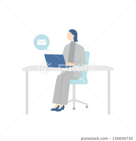 A female business person receives an email notification on her computer 136698730