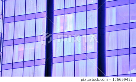 Modern sustainable glass office buildings. Exterior view of corporate headquarters glass buildings architecture.Glass windows in energy-efficient buildings. Financial business center buildings. Modern sustainable glass office buildings. Exterior view of corporate headquarters glass buildings architecture.Glass windows in energy-efficient buildings. Financial business center buildings. 136699452