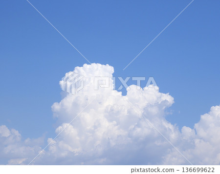 Cumulus clouds rising from below Cumulus clouds rising from below 136699622