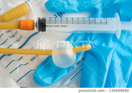 Foley catheter and urine drainage bag collect urine for disability or patient in hospital. Foley catheter and urine drainage bag collect urine for disability or patient in hospital. 136699680