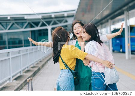 Female friends reuniting at the airport (Photo courtesy of Kansai International Airport (KIX)) Female friends reuniting at the airport (Photo courtesy of Kansai International Airport (KIX)) 136700537