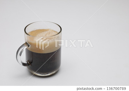 Coffee with plenty of crema (left) Coffee with plenty of crema (left) 136700789