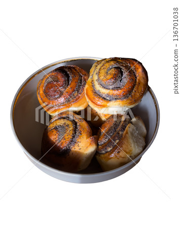 Traditional swirl pastry rolls with abundance of poppy seeds 136701038