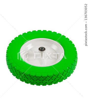 Wheel is pneumatic on a white background. Green rubber, white disc. Wheel is pneumatic on a white background. Green rubber, white disc. 136703052