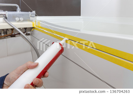 Bathtub caulking replacement work 136704263