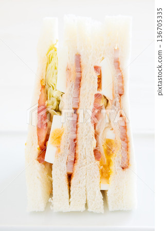 Delicious bacon, egg, lettuce, and tomato sandwich Delicious bacon, egg, lettuce, and tomato sandwich 136705335