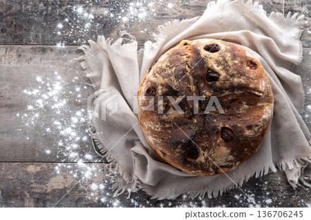 Traditional Irish soda bread with raisins, freshly baked Traditional Irish soda bread with raisins, freshly baked 136706245
