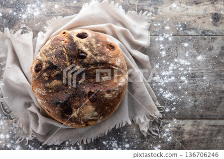 Traditional Irish soda bread with raisins, freshly baked Traditional Irish soda bread with raisins, freshly baked 136706246