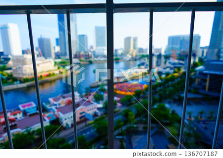 Urban landscape, blur effect, through the fence, port town, skyscrapers 136707187