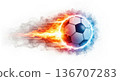 Soccer ball flying fast surrounded by fire and smoke 136707283
