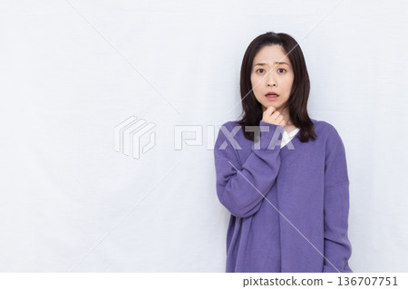 Surprised and amazed woman Surprised and amazed woman 136707751