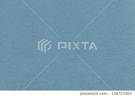 Dusty blue textured paper background with subtle grain surface and soft structure. Cold backdrop, macro Dusty blue textured paper background with subtle grain surface and soft structure. Cold backdrop, macro 136707863