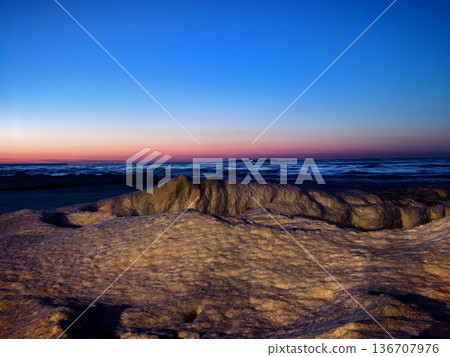 Snow and ice formations and sunset on the Baltic Sea coast Snow and ice formations and sunset on the Baltic Sea coast 136707976