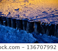 Wooden breakwaters in ice and snow in the Baltic Sea 136707992