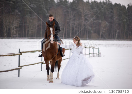 Romantic Winter Wedding Couple With Horse Outdoors Romantic Winter Wedding Couple With Horse Outdoors 136708710