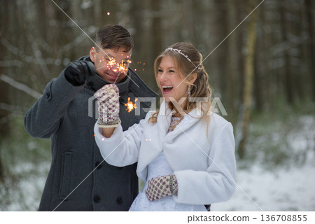 Groom Teasing Bride With Sparkler Play Groom Teasing Bride With Sparkler Play 136708855