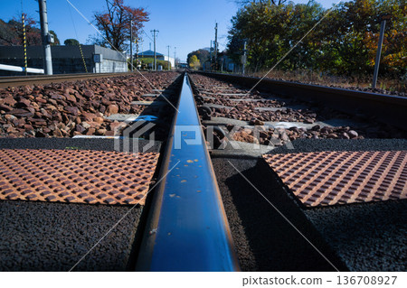 Graveled tracks on a rural local line 136708927