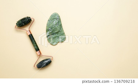 Marble facial roller, gua sha for skincare and relaxation 136709218