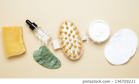 Natural beauty set with gua sha, wooden body brush, face cream and serum 136709221