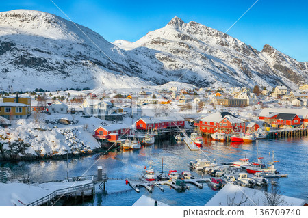 Captivating snowy  cityscape of Sorvagen town and port. 136709740