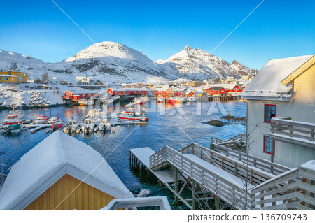 Captivating snowy cityscape of Sorvagen town and port. Captivating snowy cityscape of Sorvagen town and port. 136709743
