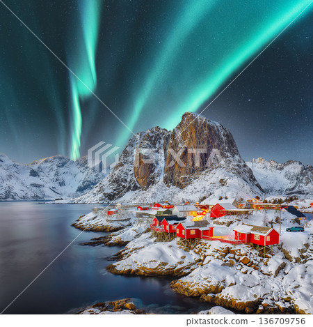 Breathtaking winter view on Hamnoy village at night with Northern lights (Aurora Borealis). 136709756