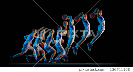 Basketball player jump shot progression in stroboscopic light. Basketball player jump shot progression in stroboscopic light. 136711108