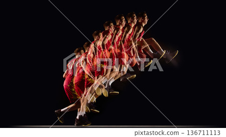 Basketball player forward leap stroboscopic sequence. Basketball player forward leap stroboscopic sequence. 136711113