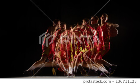 Basketball player turning with ball stroboscopic effect. Basketball player turning with ball stroboscopic effect. 136711123