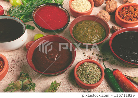 assortment of Georgian sauces and spices, top view, set of spices and tkemali, Georgian, food background, assortment of Georgian sauces and spices, top view, set of spices and tkemali, Georgian, food background, 136711929