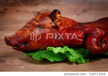 Baked, fried piglet, on a wooden table, no people, Baked, fried piglet, on a wooden table, no people, 136711938