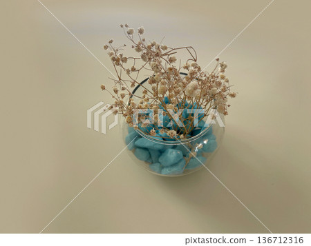 vase with blue stowns isolated on white table 136712316