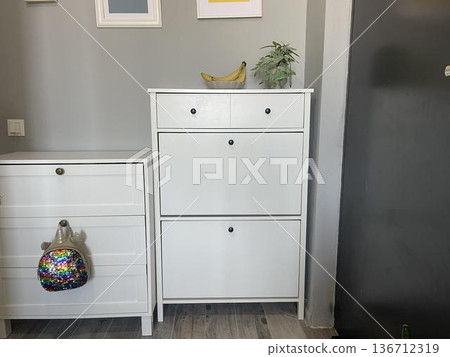 the back pack on the dresser on the right 136712319