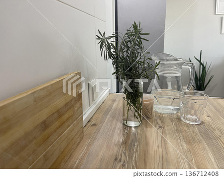 transparent dishes on the kitchen table 136712408