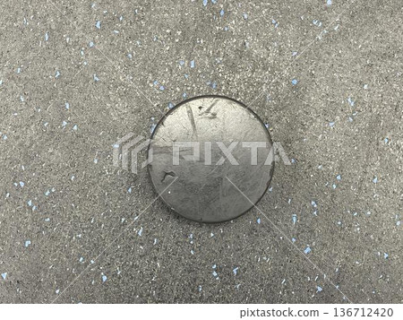 hockey puck on a gray background 136712420