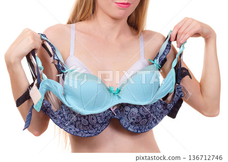 Female holds bras. Bra fitting Female holds bras. Bra fitting 136712746