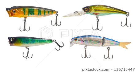 set of fishing tackle, wobblers on a white isolated set of fishing tackle, wobblers on a white isolated 136713447