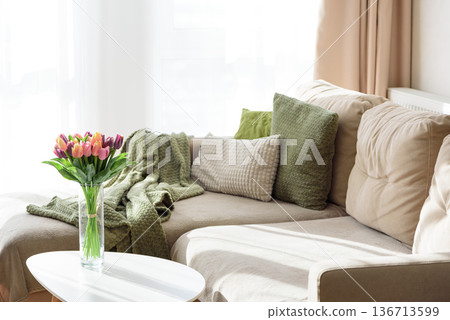 Living Room Decorated Spring Tulip Bouquet in Green Vase. Cozy Home Decor Arrangement Living Room Decorated Spring Tulip Bouquet in Green Vase. Cozy Home Decor Arrangement 136713599