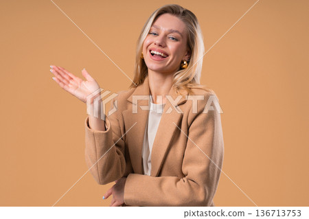 Friendly Young Blonde BusinessWoman Waving Hand - Hello, Or Salute, Chao Friendly Young Blonde BusinessWoman Waving Hand - Hello, Or Salute, Chao 136713753