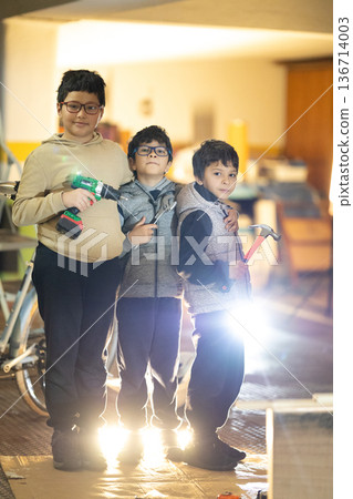 Children learning home improvement with building tools Children learning home improvement with building tools 136714003