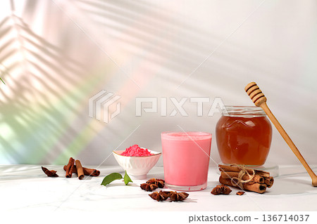 Pink moon milk matcha latte with cinnamon, anise and honey spices on sunny table. Weight loss and alternative medicine concept, relaxing drink before bed and boosting immunity, Indian advertisement 136714037