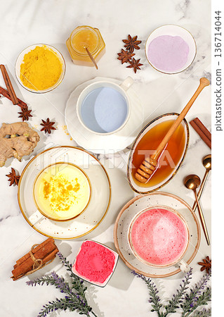 Selection of colorful varieties of matcha latte, Japanese tea, golden turmeric, lavender blue, pink moon milk. This trendy, healthy drink promotes weight loss,has anti inflammatory properties 136714044