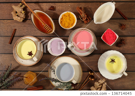 Variety of colorful matcha latte, Japanese tea, golden turmeric, lavender blue and pink moon milk,trendy healthy drink promotes weight loss,relaxing drink before bed, has anti inflammatory properties Variety of colorful matcha latte, Japanese tea, golden turmeric, lavender blue and pink moon milk,trendy healthy drink promotes weight loss,relaxing drink before bed, has anti inflammatory properties 136714045