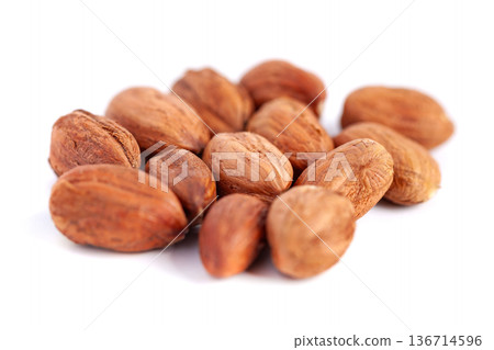 Hazelnuts kernels on a white background, healthy food. Macro 136714596