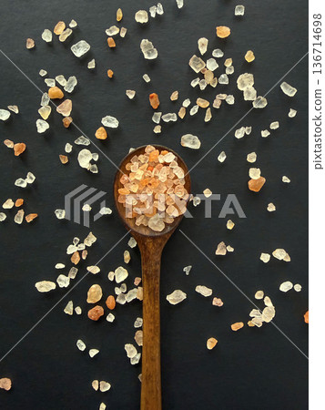 Pink Himalayan Salt Crystals on Wooden Spoon Flat Lay Pink Himalayan Salt Crystals on Wooden Spoon Flat Lay 136714698