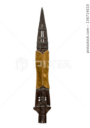 Spear of Longinus Holy Lance replica displayed in a museum exhibition, historical Christian relic associated with the crucifixion of Jesus Christ, metal blade with leather covering photographed 136714810