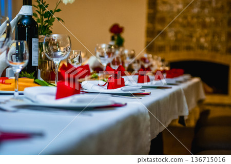 Festive table setting with bread and wine glasses Festive table setting with bread and wine glasses 136715016
