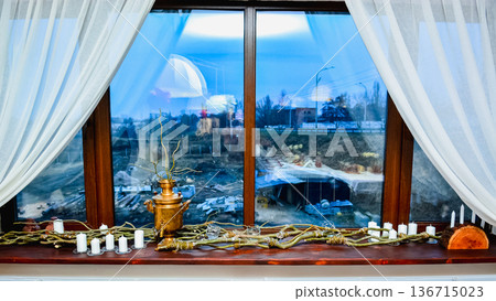 Window display with brass samovar and candles arrangement 136715023