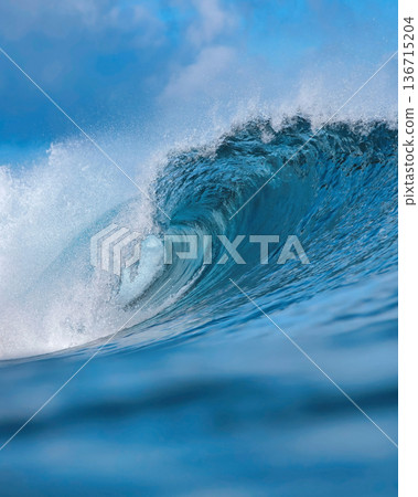Majestic ocean swell with shimmering sunlight and foamy crest Majestic ocean swell with shimmering sunlight and foamy crest 136715204