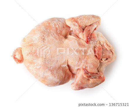 Top view of a whole frozen raw chicken isolated on a white background. Perfect for themes of food storage, poultry products, grocery shopping, and cooking preparation. High quality photo Top view of a whole frozen raw chicken isolated on a white background. Perfect for themes of food storage, poultry products, grocery shopping, and cooking preparation. High quality photo 136715321